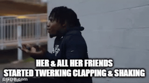 Man Standing In Front Of Building With Caption Her & All Her Friends Started Twerking Clapping & Shaking GIF