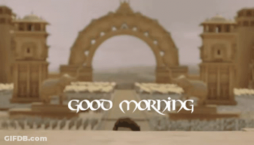 Man Standing In Front Of Building With Good Morning GIF