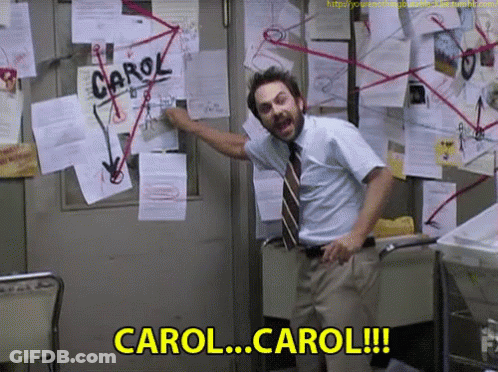 Man Standing In Front Of Bulletin Board Saying Carol GIF