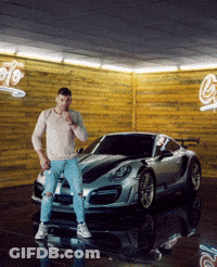 Man Standing In Front Of Car With G Sign GIF