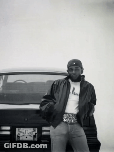 Man Standing In Front Of Car With X License Plate GIF