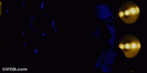 Man Standing In Front Of Champion Team Sign GIF