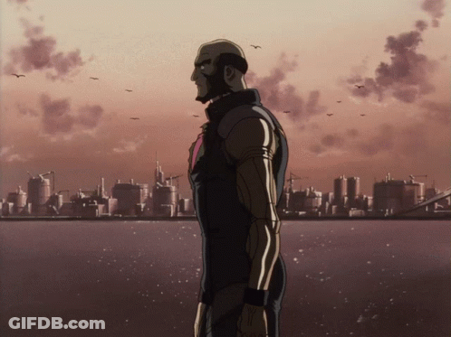 Man Standing In Front Of City With Birds GIF