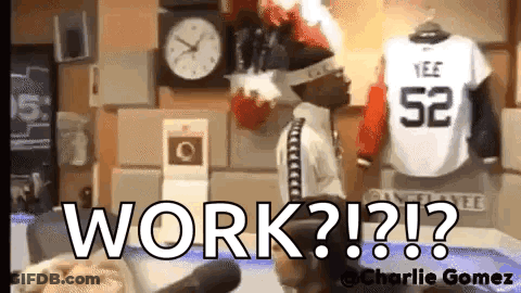Man Standing In Front Of Clock And Jersey Number 52 GIF