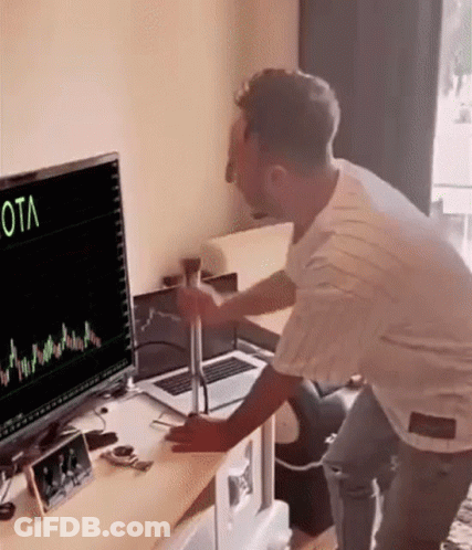 Man Standing In Front Of Computer Graph GIF