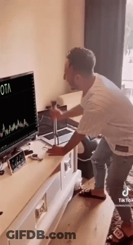 Man Standing In Front Of Computer Screen Saying Ota GIF