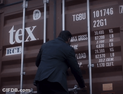 Man Standing In Front Of Container Saying TGUB GIF