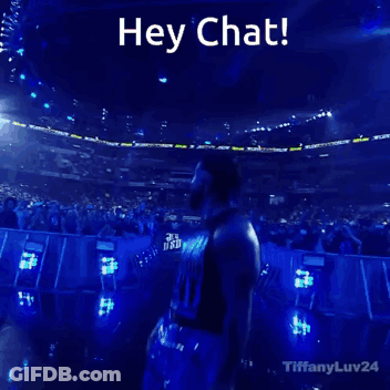 Man Standing In Front Of Crowd Saying Hey Chat GIF