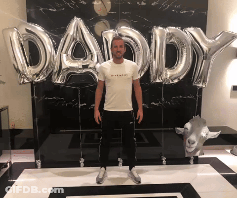 Man Standing In Front Of Daddy Balloons GIF