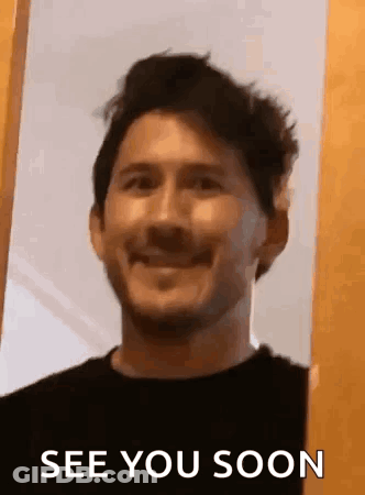 Man Standing In Front Of Door Saying See You Soon GIF