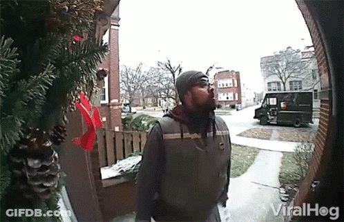 Man Standing In Front Of Door With Van And Viralhog GIF