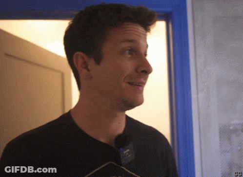 Man Standing In Front Of Door With Watermark CC GIF