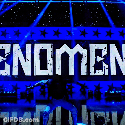 Man Standing In Front Of Endomen Sign GIF
