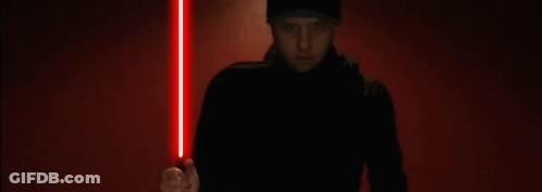 Man Standing In Front Of Fail Sign GIF