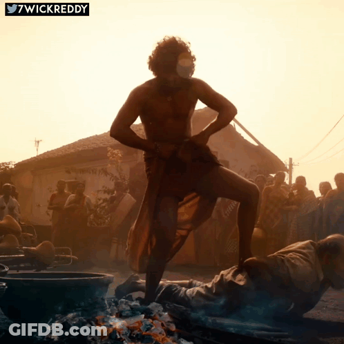Man Standing In Front Of Fire 7Wickreddy GIF