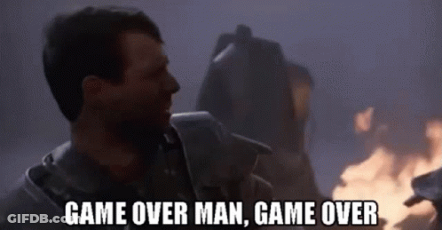Man Standing In Front Of Fire Says Game Over GIF