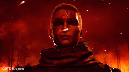 Man Standing In Front Of Fire With Gun GIF