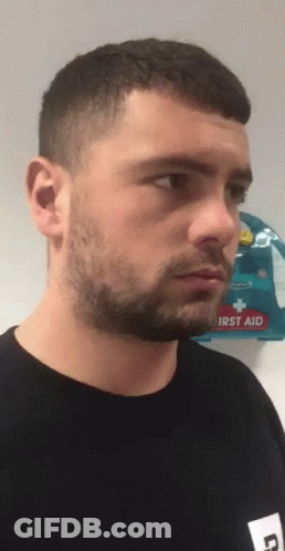 Man Standing In Front Of First Aid Bag GIF