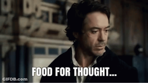 Man Standing In Front Of Food For Thought Sign GIF