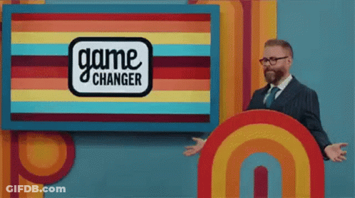 Man Standing In Front Of Game Changer Sign GIF
