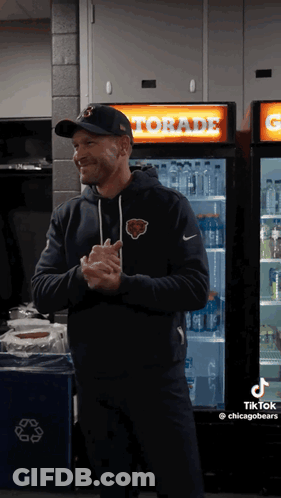 Man Standing In Front Of Gatorade Refrigerator GIF