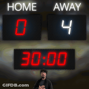 Man Standing In Front Of Home And Away Scoreboard GIF