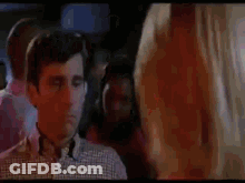 Man Standing In Front Of Hope You Have A Big Trunk Sign GIF