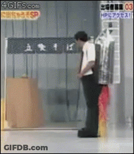 Man Standing In Front Of HP Sign GIF