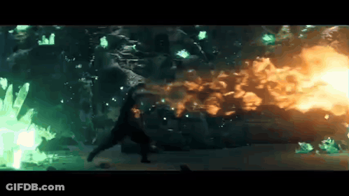 Man Standing In Front Of Huge Explosion GIF