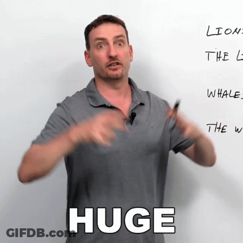 Man Standing In Front Of Huge Whiteboard GIF