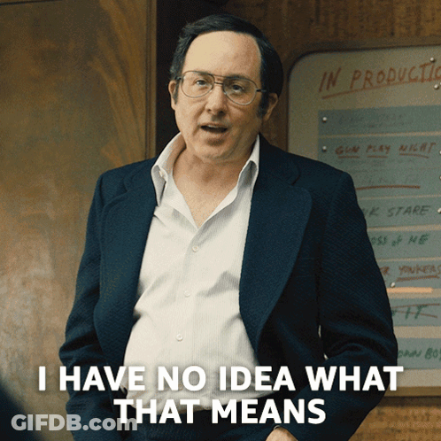 Man Standing In Front Of In Production Board GIF