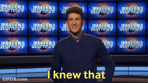 Man Standing In Front Of Jeopardy Screen GIF