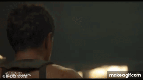 Man Standing In Front Of Lantern GIF