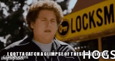 Man Standing In Front Of Locksmith School Bus GIF
