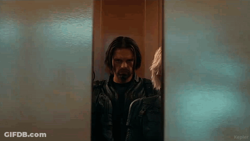 Man Standing In Front Of Mirror GIF