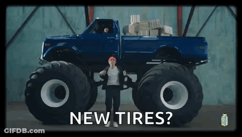Man Standing In Front Of Monster Truck Saying New Tires GIF