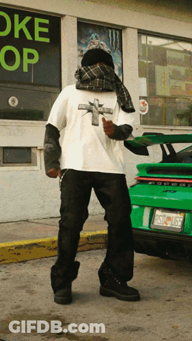 Man Standing In Front Of Oke Store GIF