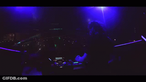Man Standing In Front Of Pioneer Turntable GIF