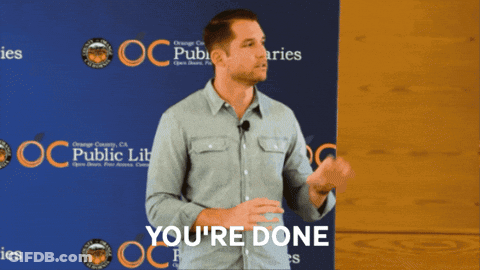Man Standing In Front Of Public Library GIF