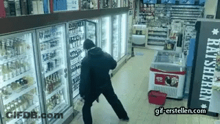 Man Standing In Front Of Raitsherra Refrigerator GIF