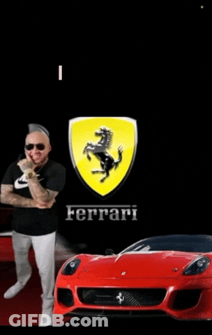 Man Standing In Front Of Red Ferrari GIF