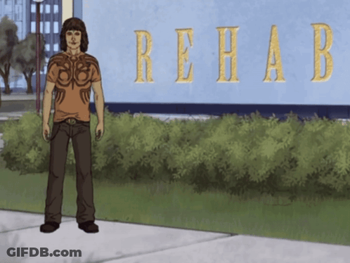 Man Standing In Front Of Rehab Building GIF