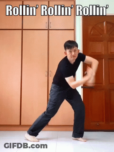 Man Standing In Front Of Rollin' Door GIF