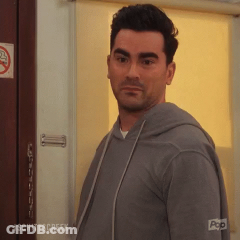 Man Standing In Front Of #Schittscreek Door GIF