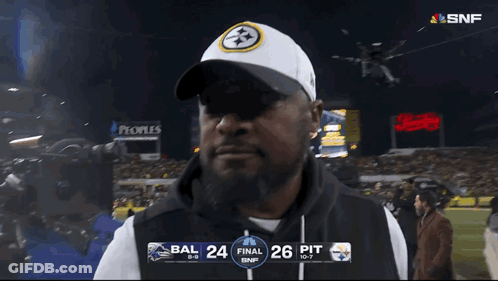 Man Standing In Front Of Scoreboard Saying Bal 24 GIF