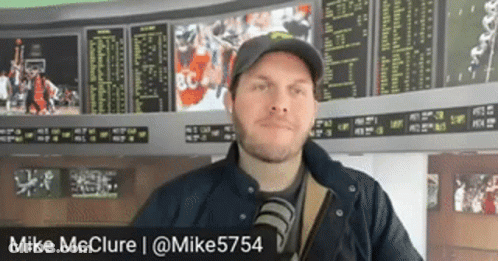 Man Standing In Front Of Screen With Name Mike GIF