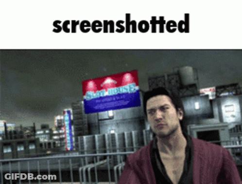 Man Standing In Front Of Screenshotted Sign GIF