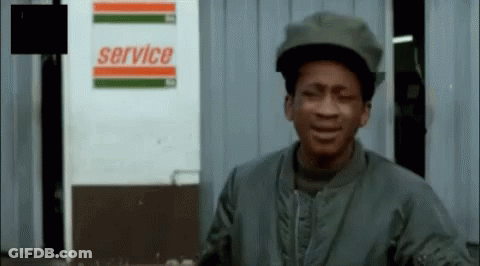Man Standing In Front Of Service Sign GIF