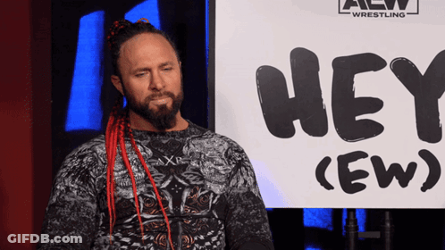 Man Standing In Front Of Sign Saying Hey GIF