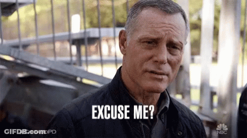 Man Standing In Front Of Staircase Asking To Excuse Him GIF